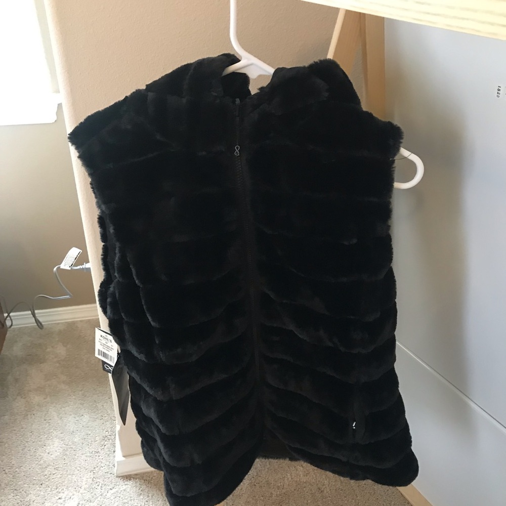 black fuzzy vest